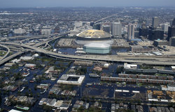 An aerial view of the flooding in part of the Central Business District].  The Superdome is at center.